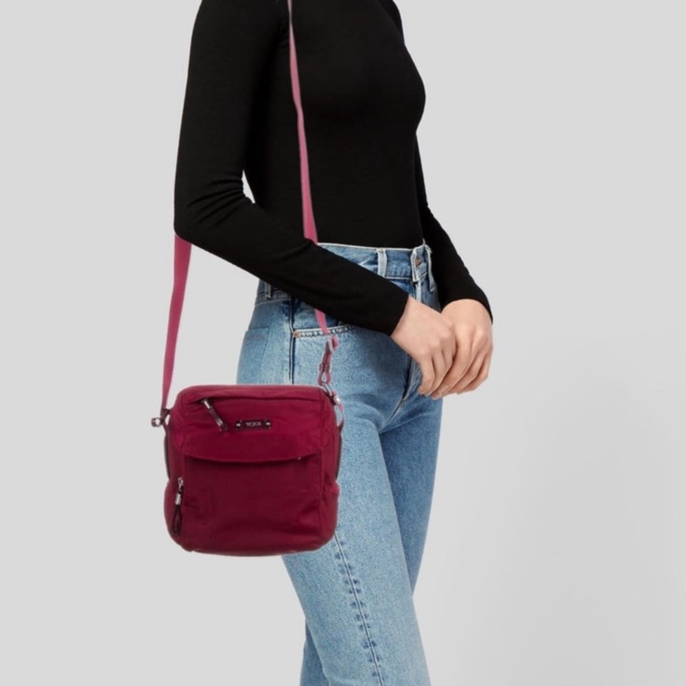 Tumi Saffiano trimmed nylon red crossbody bag. EUC.